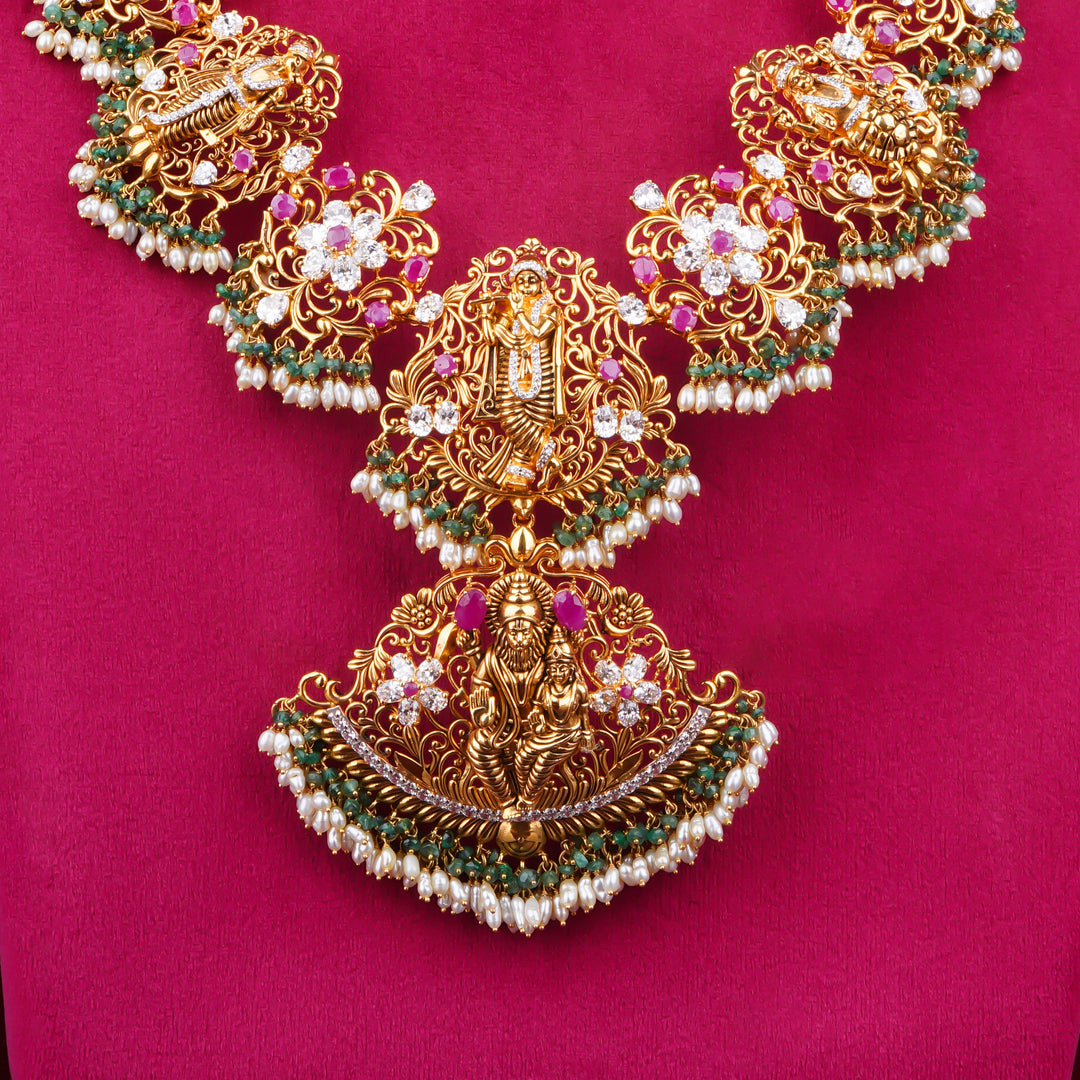 22KT Temple Lakshmi Bridal Haram with Floral Motifs & Pearl Drops