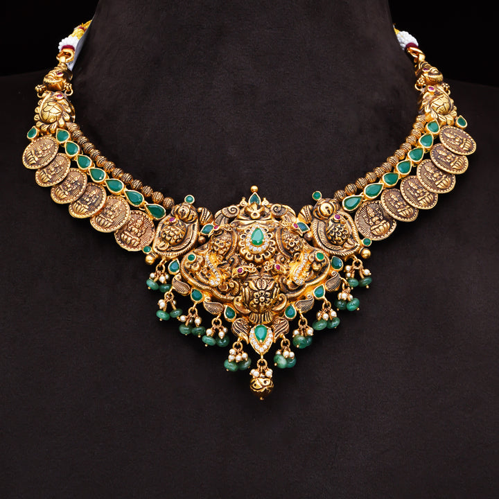 22KT Antique Temple Necklace with Lakshmi Pendant & Green Stones