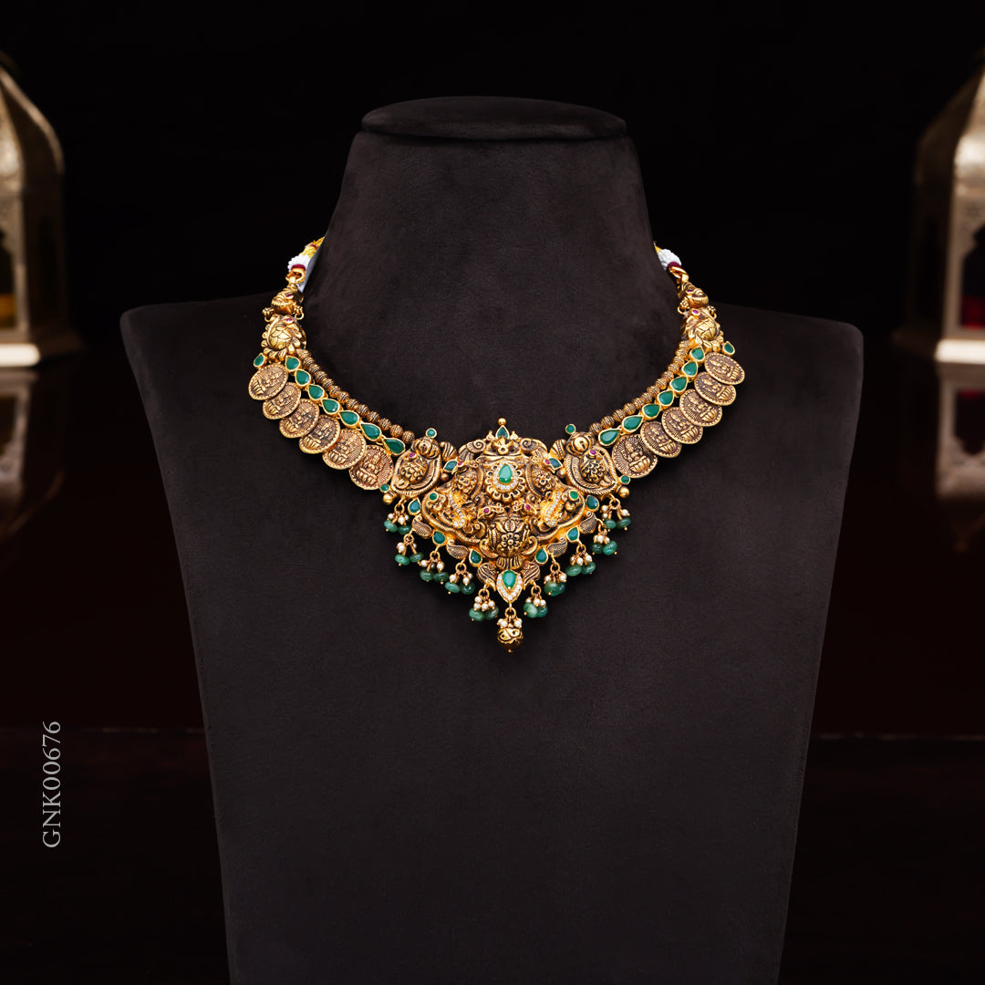 22KT Antique Temple Necklace with Lakshmi Pendant & Green Stones